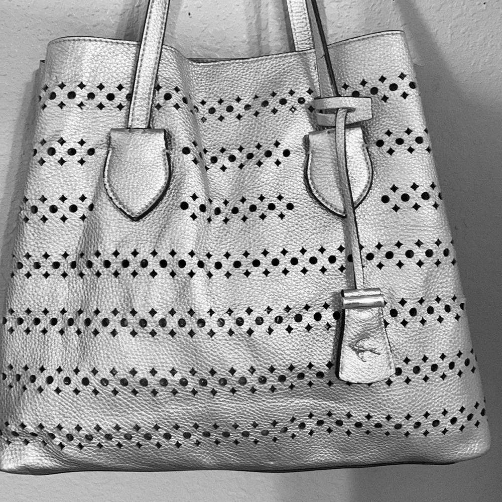 100% vegan leather perforated silver bag